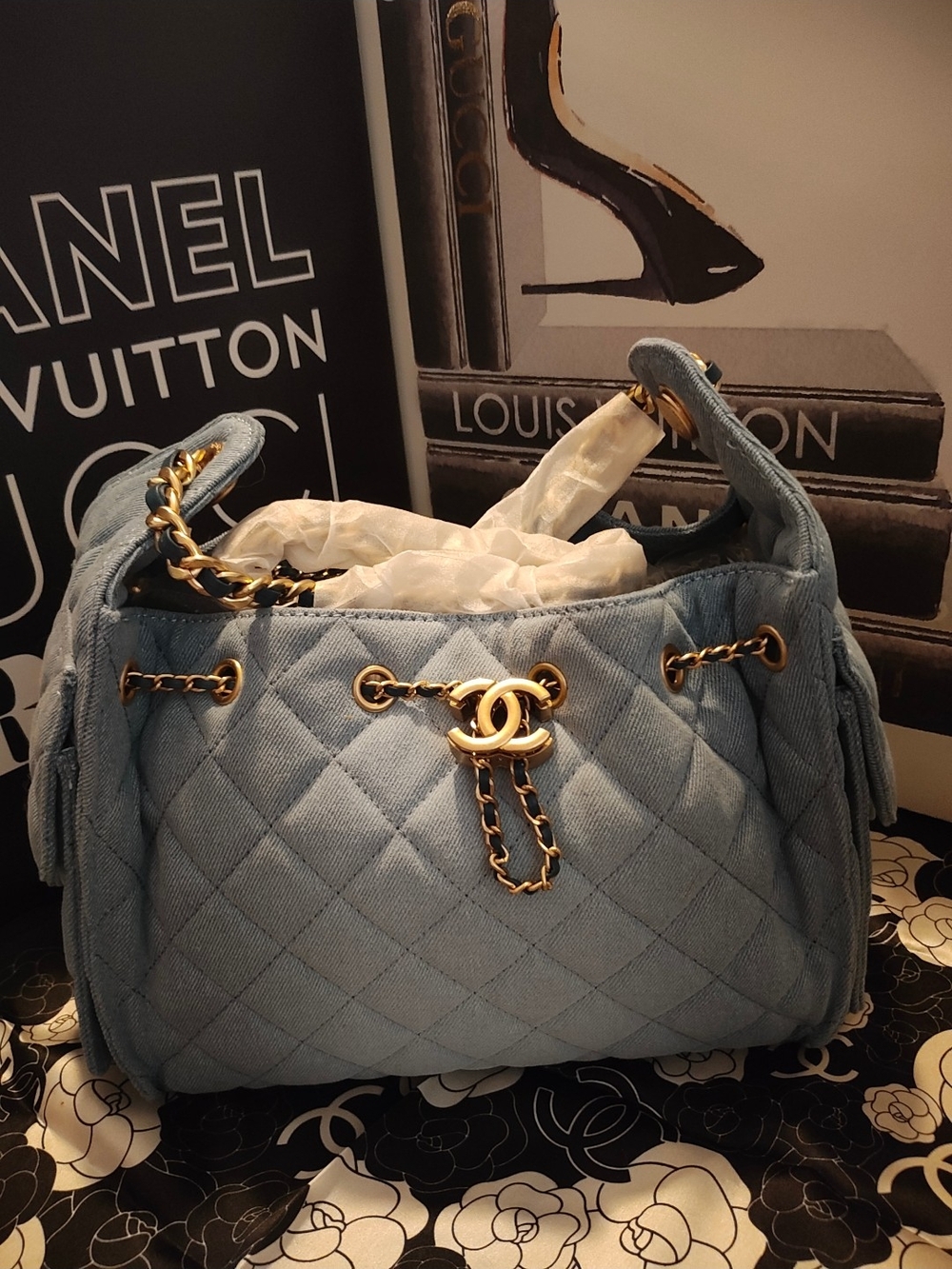 Light Blue Quilted Denim Drawstring Shoulder Bag with Gold-Tone Hardware